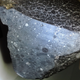 Image for article titled 30 Starry Wonders Hiding Inside of Dull Meteorites